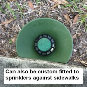 sprinkler head next to sidewalks
